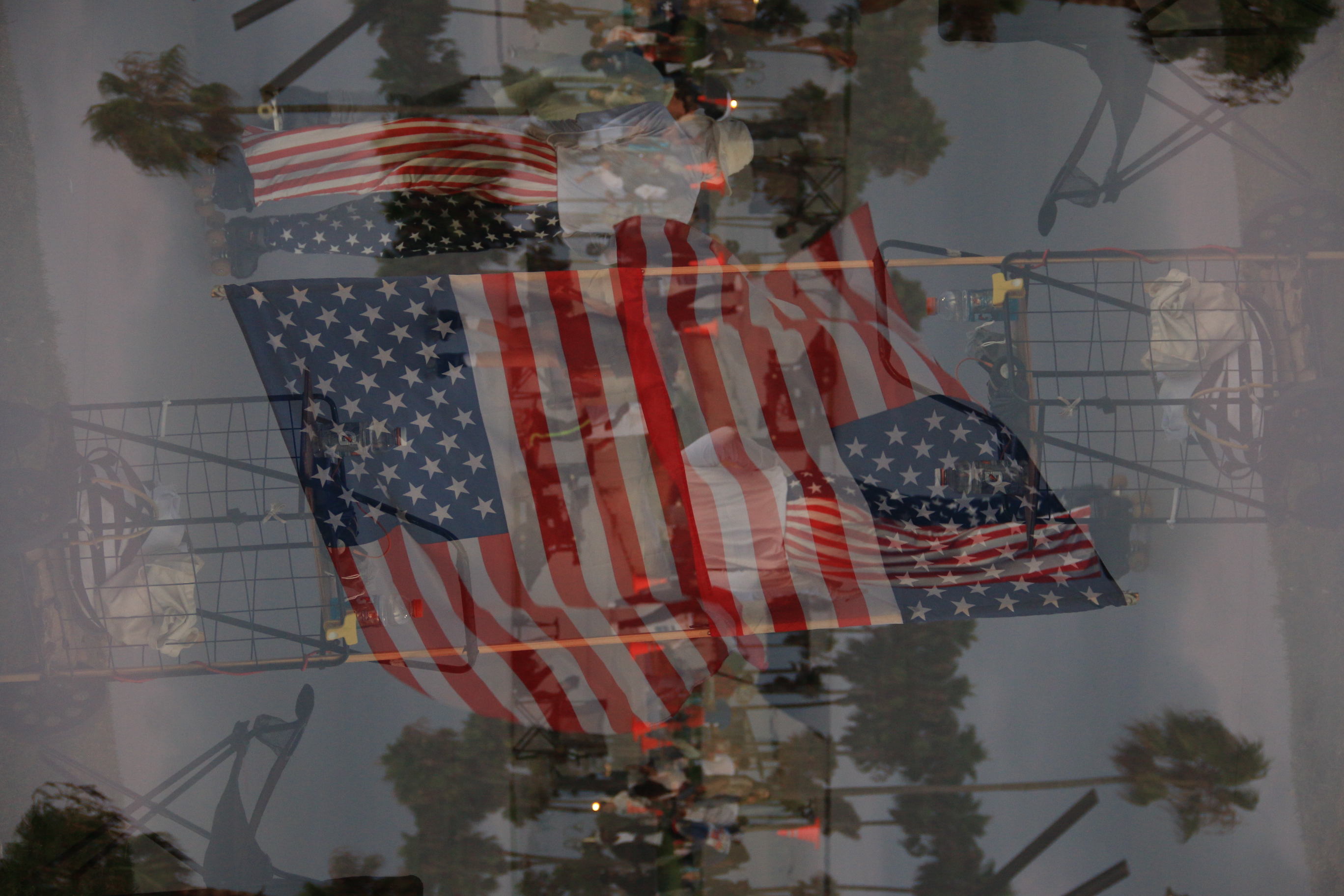 American flag layered over Venice Beach in a digital multi-exposure