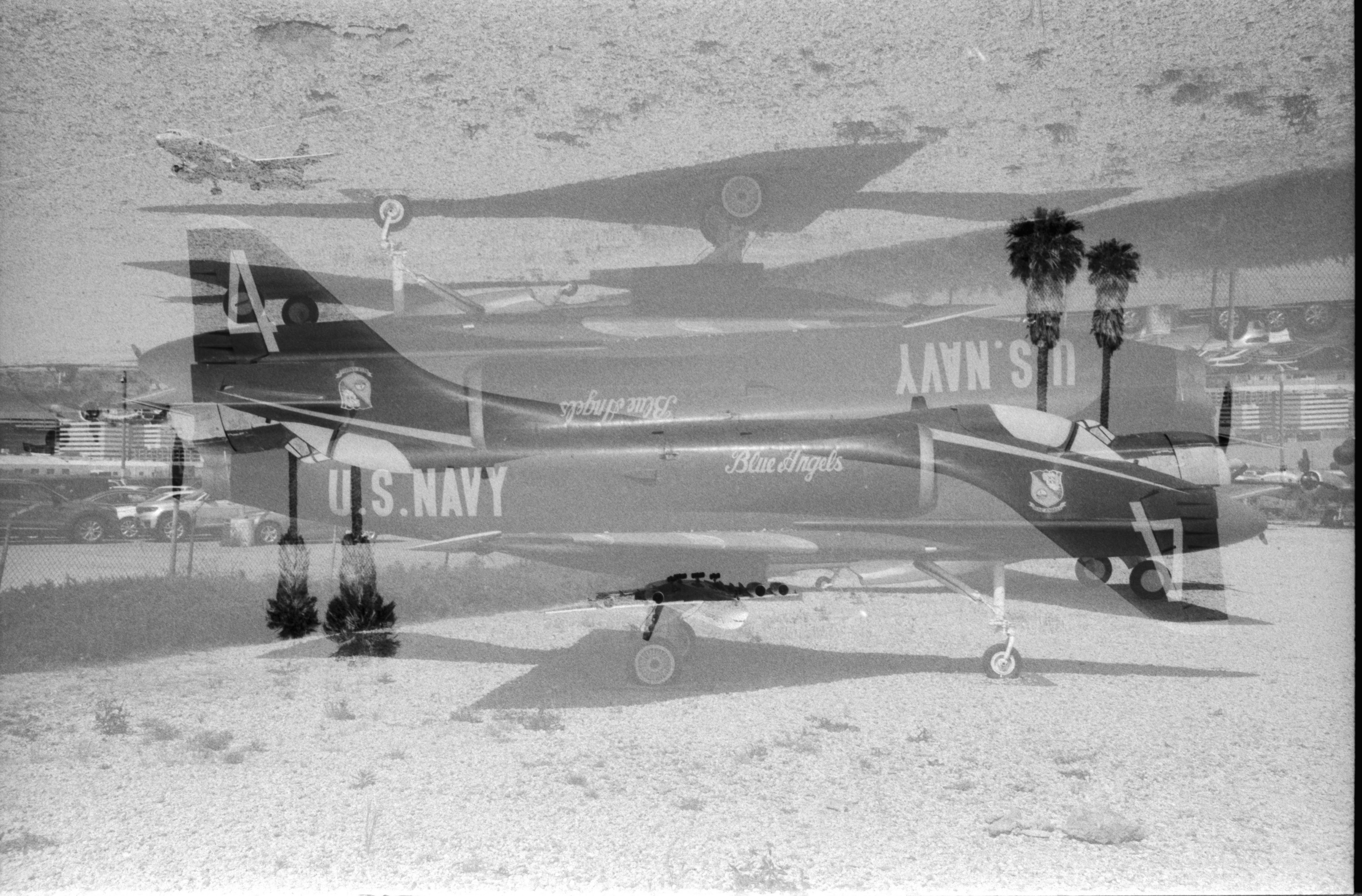 Black-and-white film photograph of Navy jets