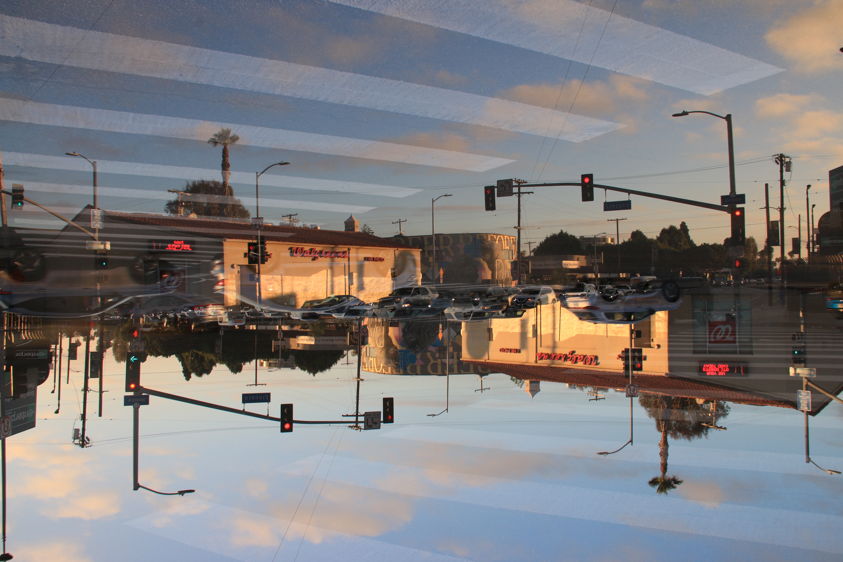 Venice Beach street and pedestrians in a mirrored digital multi-exposure